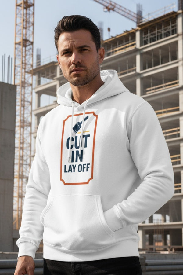 Man wearing a white hoodie with text in an urban setting