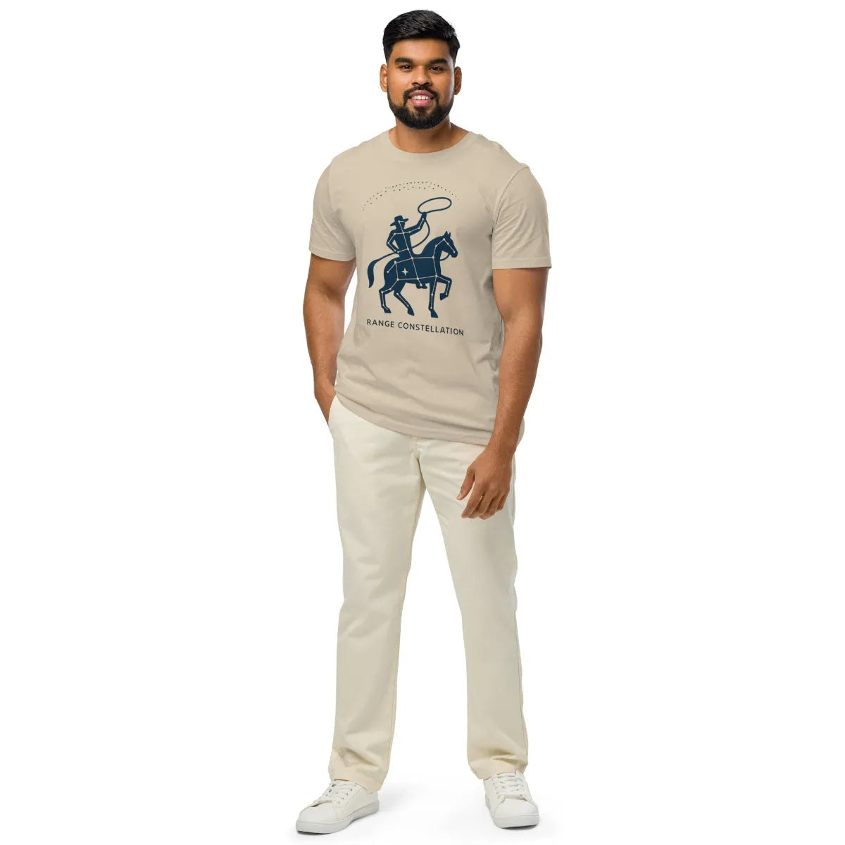 A chrome lightning bolt graphic on a wrinkled, unbleached cotton t-shirt. Harsh, direct light.