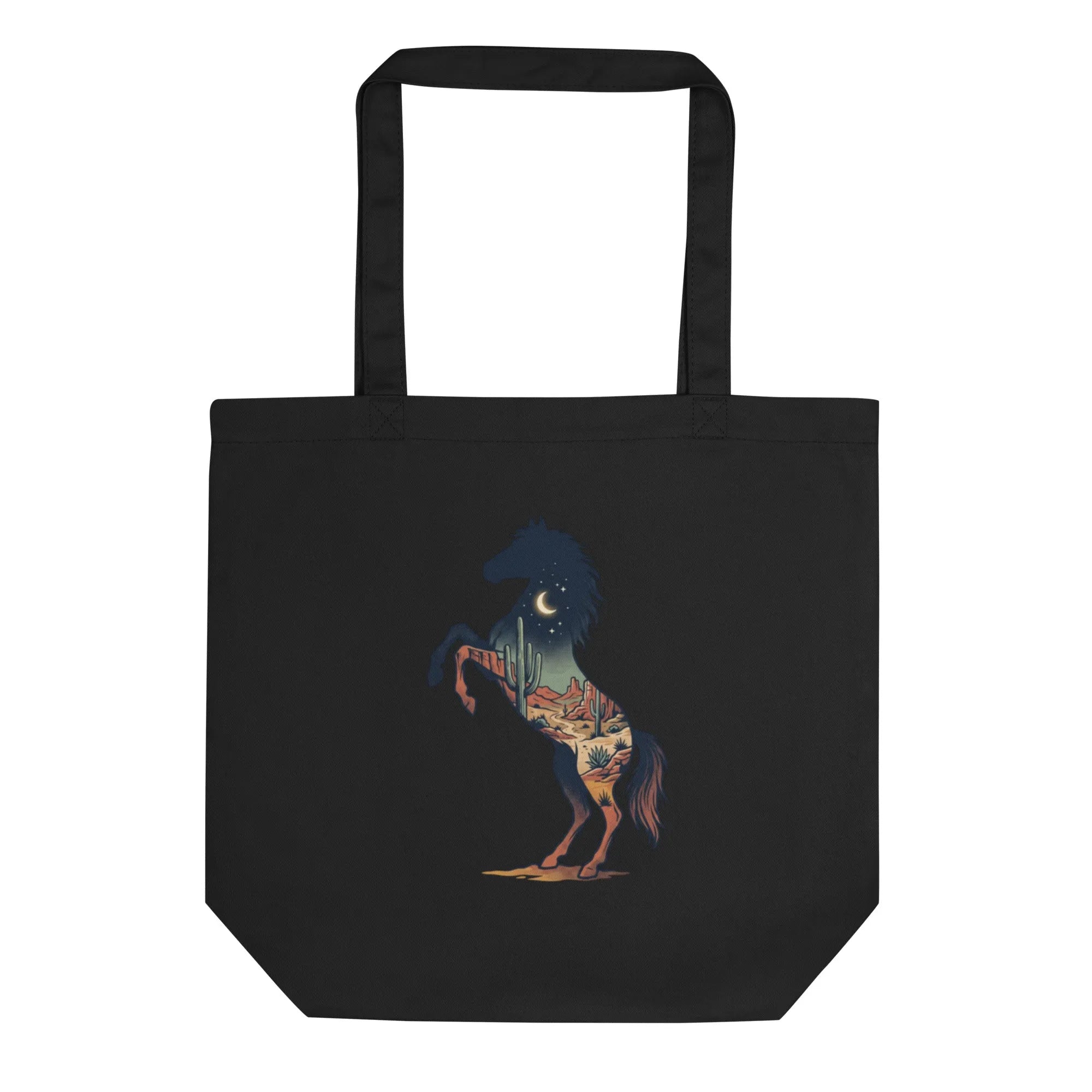 A GOTS-certified organic cotton tote bag in deep charcoal, held by weathered hands. Harsh noon sun casts sharp shadows.