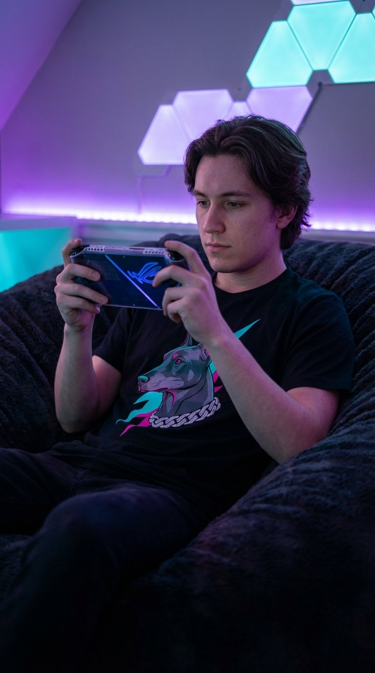 A close-up of a graphic tee, the Doberman's eye rendered in sharp detail, catching a glint of harsh neon light.