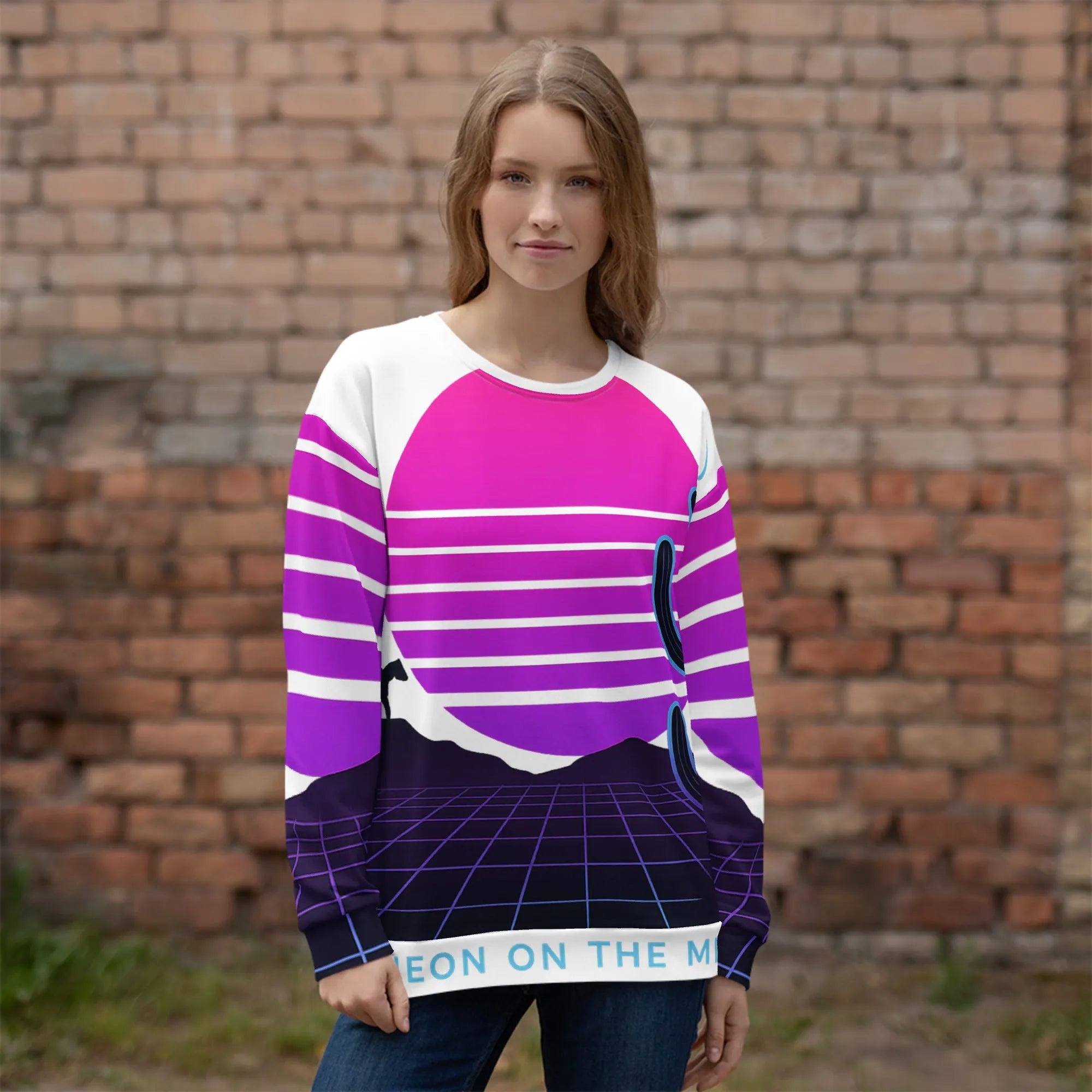 A neon orange graphic on a faded charcoal grey sweatshirt, lit by a harsh, unforgiving sun.