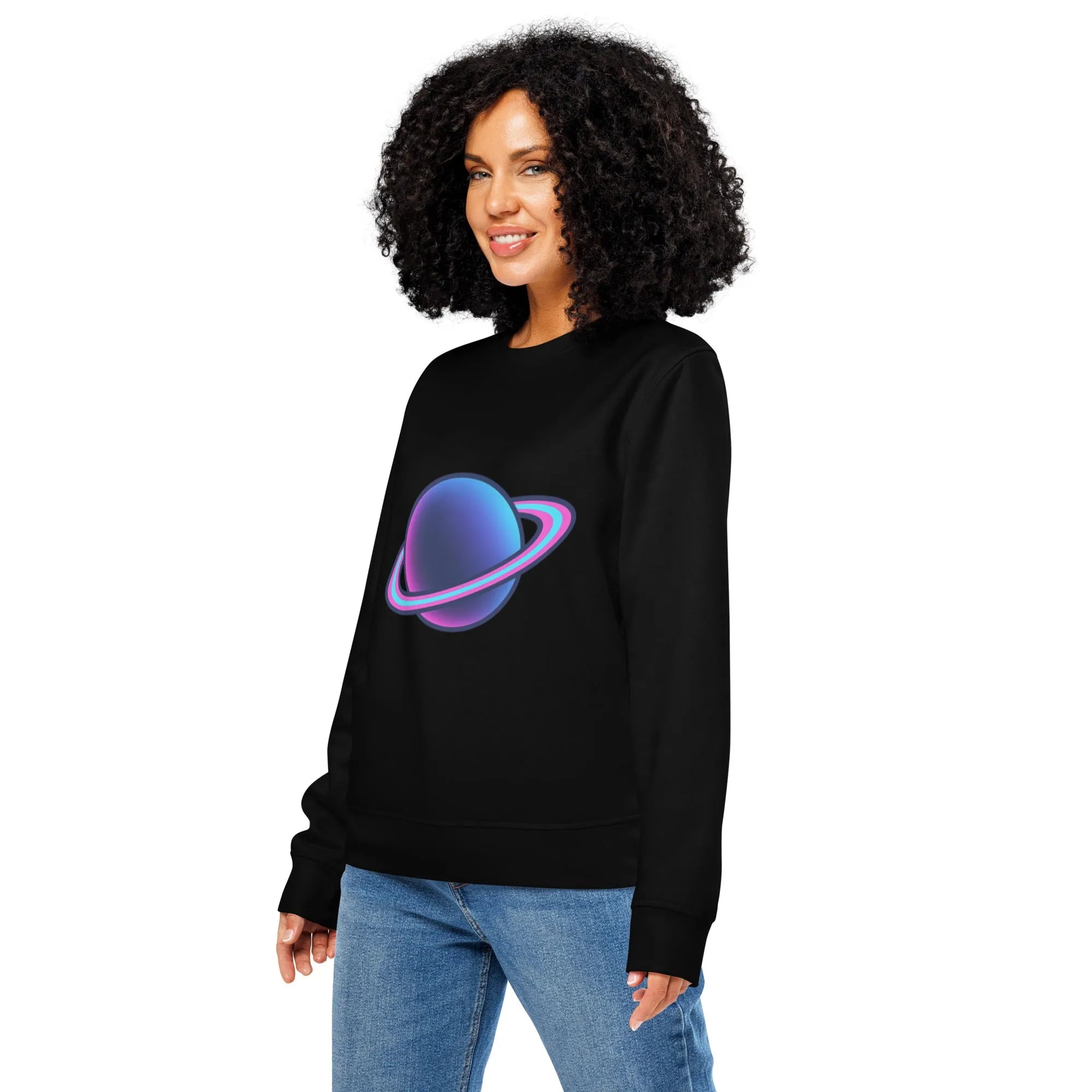 Faded grey organic cotton sweatshirt sleeve with a small, embroidered planet detail catching soft, diffused light.
