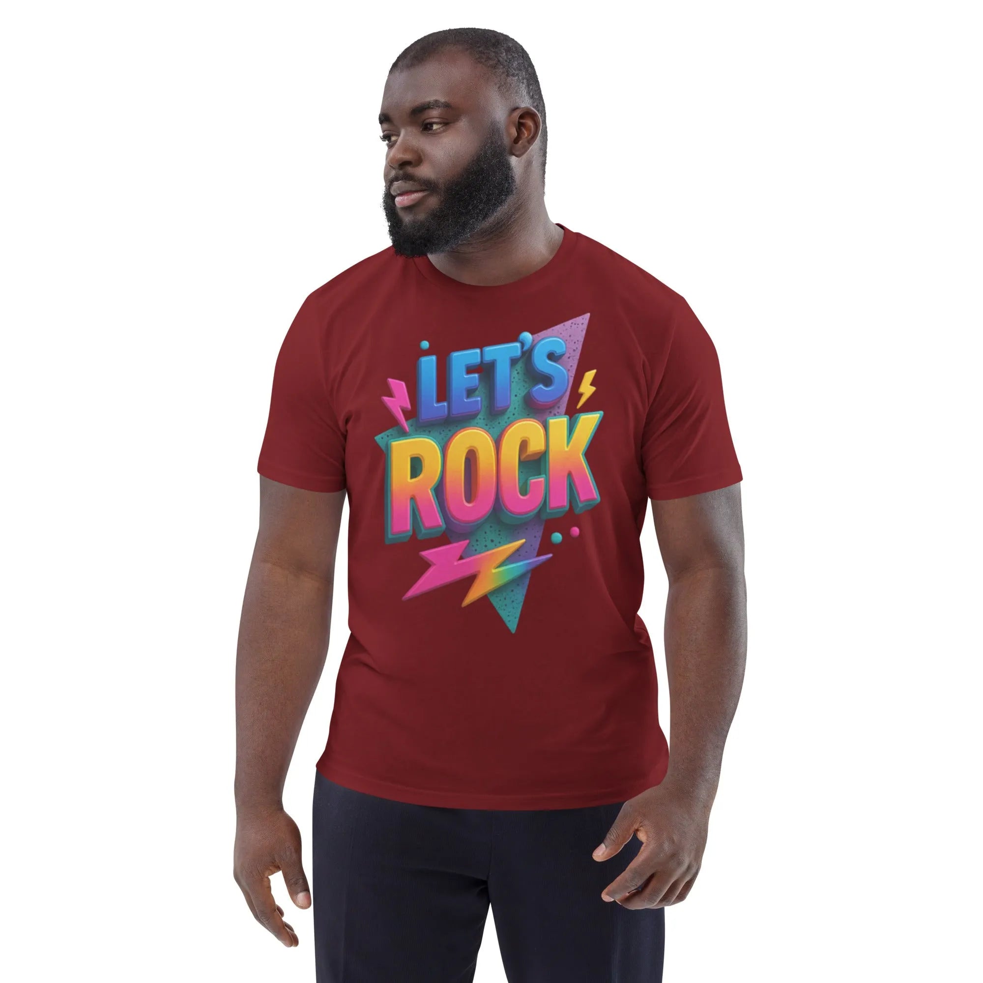 A neon graphic on a textured, unbleached organic cotton tee, lit by a single, harsh spotlight.