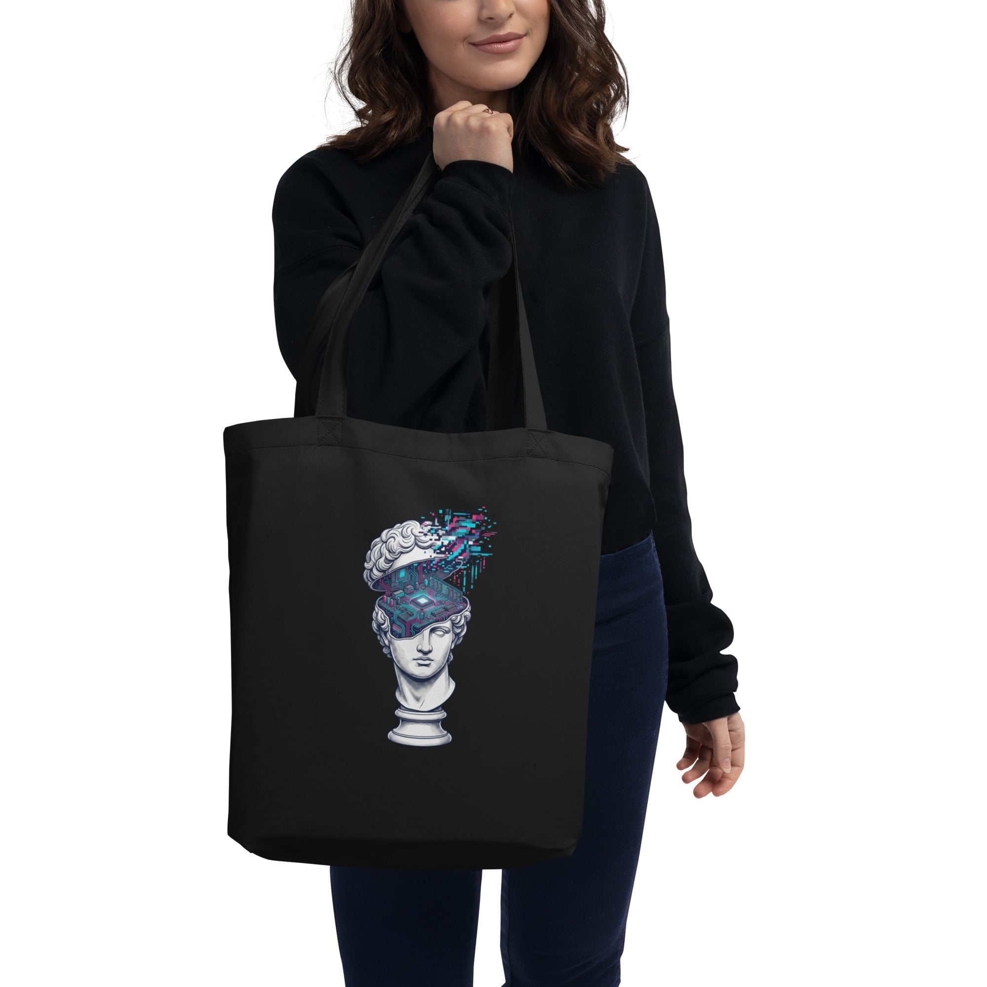 Black canvas tote bag, worn texture, harsh overhead light casting deep shadows.