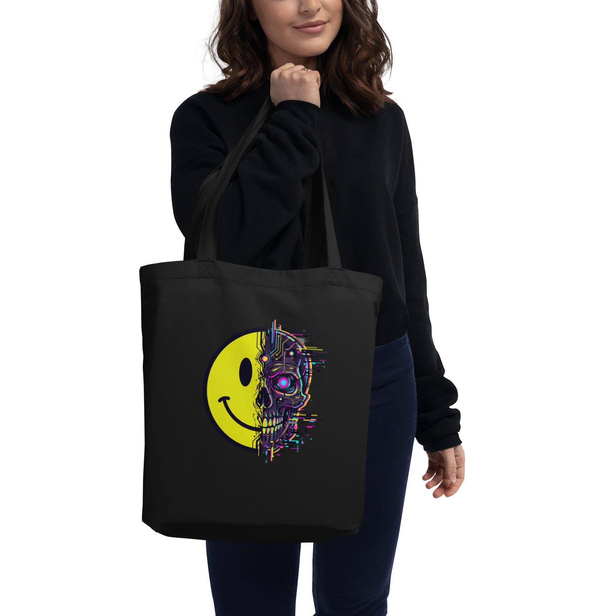 Black canvas tote bag with a desert snake and succulent print, harsh noon sun casting sharp shadows.