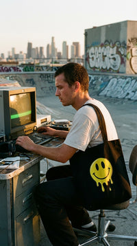Drippy Smiley Eco Tote Bag - 90s Retro Hacker in Rooftop Skatepark - Eco-Aesthetic Lifestyle
