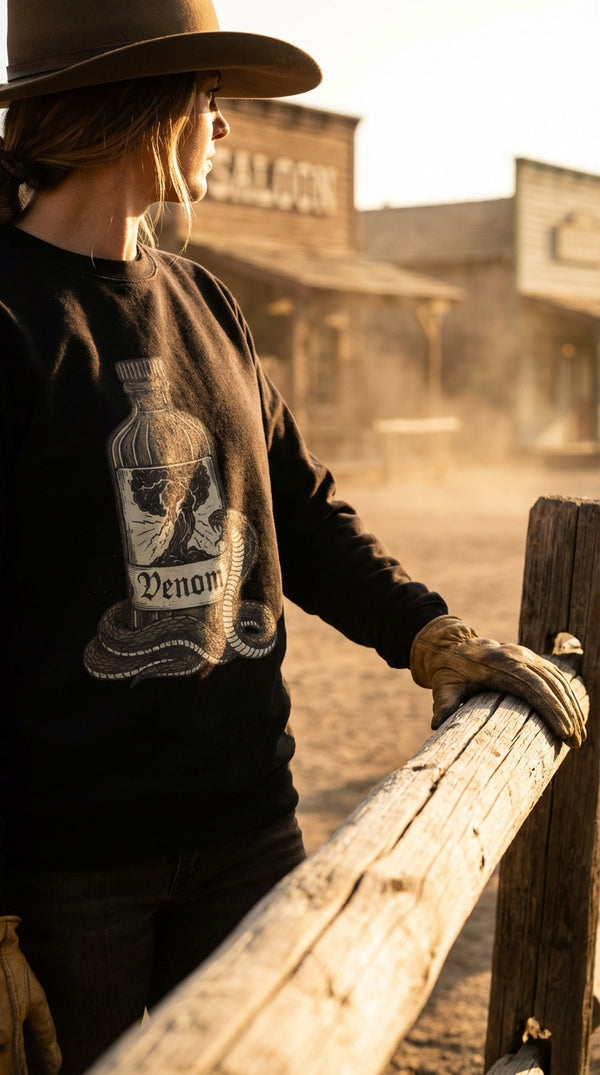 Venom Bottle Organic Sweatshirt - Western Gothic Style - Cowgirl Model in Western Town - Eco-Aesthetic Lifestyle