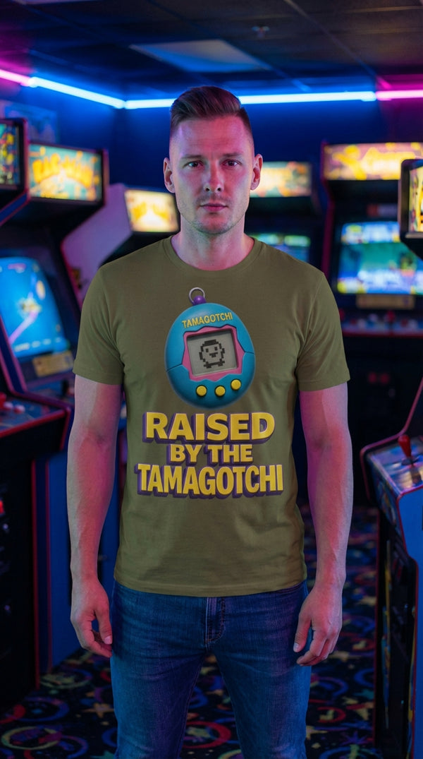 Raised by the Tamagotchi Organic Cotton Tee - Female Model in Neon Arcade Alley - 90s Grunge Revival