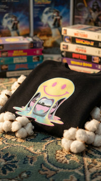Melted Chrome Smile Organic Sweatshirt - GOTS Certification Hero in VHS Rental Store - 90s Retro Sustainable