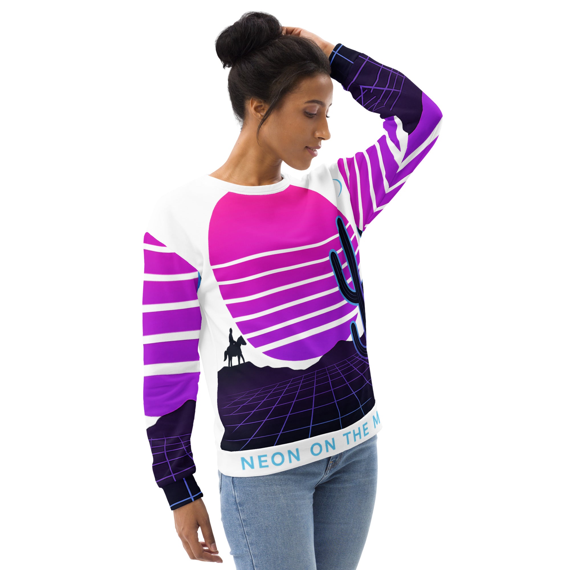 Woman wearing a colorful sweater with geometric patterns on a white background
