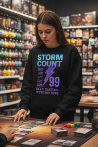 Person wearing a 'Storm Count' sweatshirt playing card games in a store.