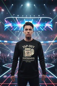 Man wearing a black t-shirt with 'Tap-Out' design in a futuristic arena setting