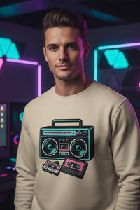 Man wearing a beige sweatshirt with a graphic design of a boombox and cassette tape in a futuristic setting.