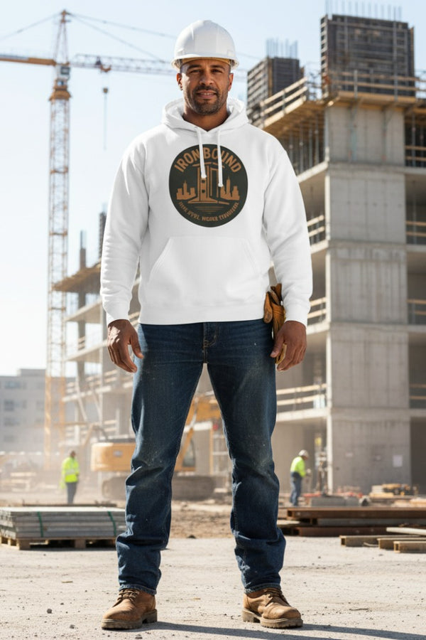 Man wearing a white hoodie with a logo and hard hat on a construction site