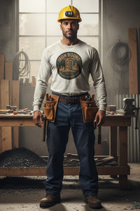 Man in a workshop wearing a 'Iron Bound' shirt and tool belts.
