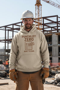 Man wearing a 'Punchlist Zero' hoodie at a construction site