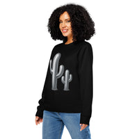 Woman wearing a black sweatshirt with cactus design on a white background
