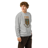 Person wearing a gray sweatshirt with a logo and text on a white background
